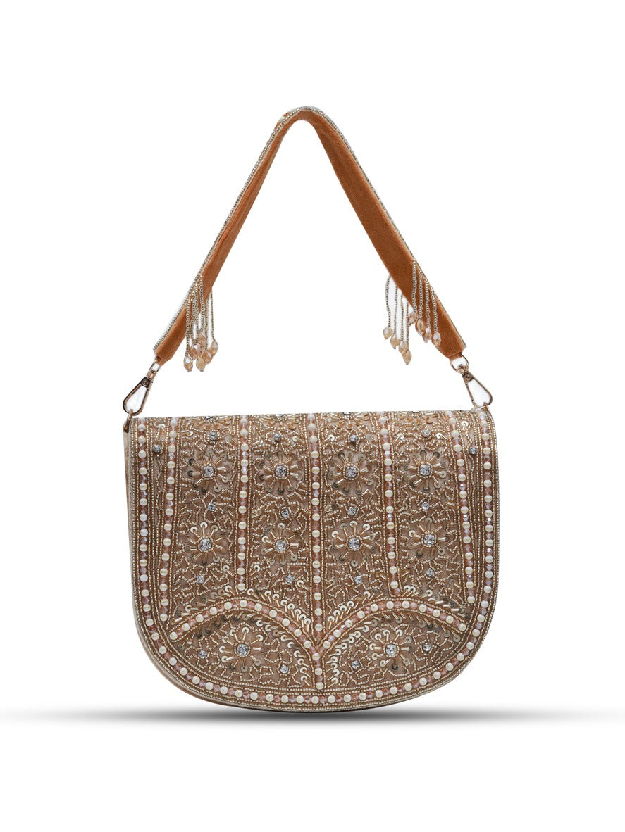 Kavya beige flap-over bag with handle from The Tan Clan, featuring a stylish design and adjustable strap, shown from front view.
