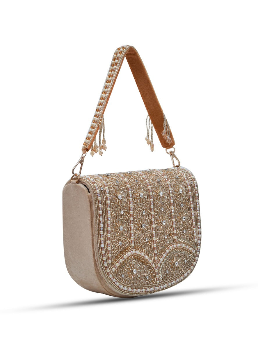 Beige Kavya flap-over bag with handle from The Tan Clan, featuring a stylish design and spacious interior.