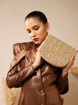 Beige Kavya flap-over bag with handle from The Tan Clan, featuring a stylish, structured design and a top handle for versatile carrying.