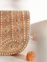 Beige Kavya gold flap-over bag with handle by The Tan Clan, featuring a stylish design and spacious interior.