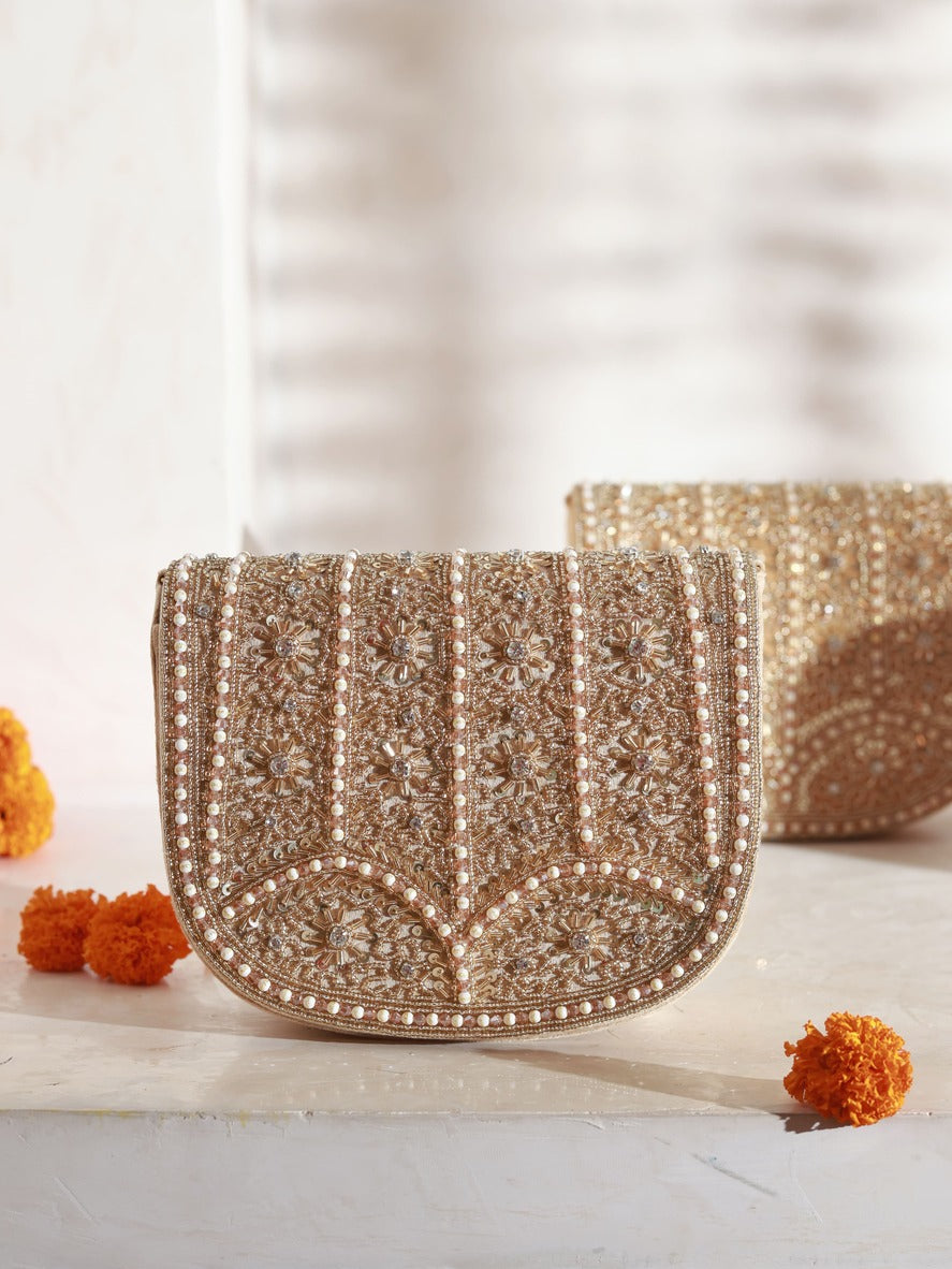 Kavya Gold Flap Over Bag by The Tan Clan with beige color, handle, and flap closure, stylish and functional accessory.