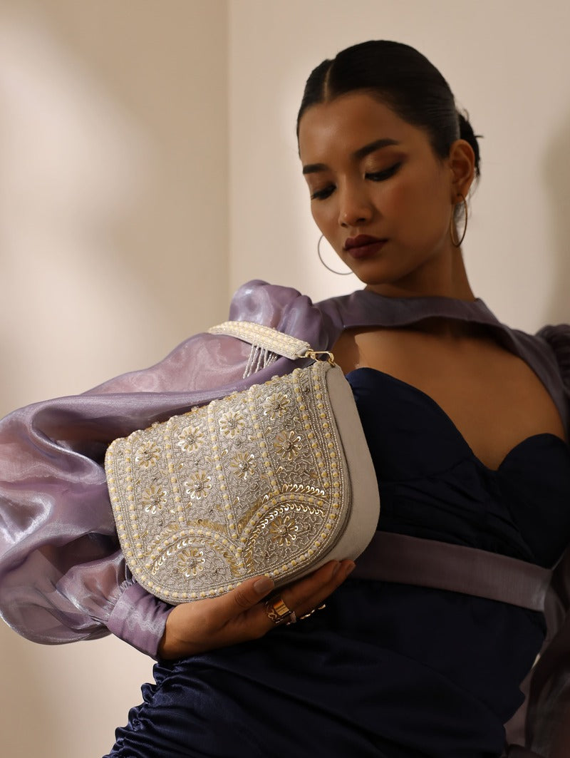 Kavya grey flap-over bag with handle by The Tan Clan, featuring a stylish design and spacious interior for everyday use.