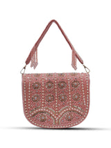Pink flap-over bag with handle from The Tan Clan, featuring beige accents and a stylish design.