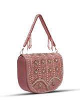 Pink Kavya flap-over bag by The Tan Clan with handle, featuring a stylish design and beige accents.