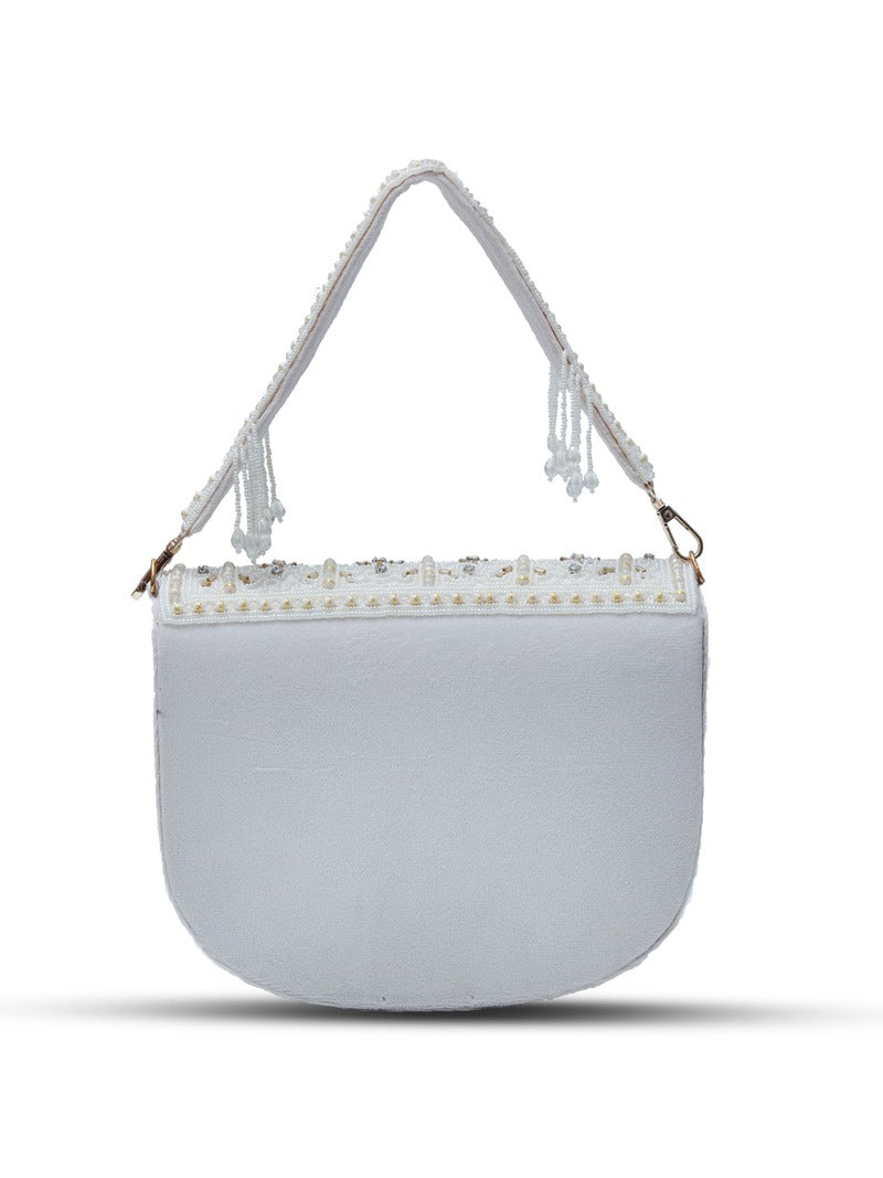 Kavya white flap-over bag with handle by The Tan Clan, featuring a stylish beige design and secure flap closure.