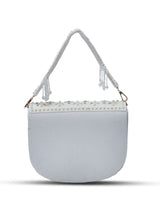 Kavya white flap-over bag with handle by The Tan Clan, featuring a stylish beige design and secure flap closure.