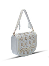 Kavya white flap-over bag with handle from The Tan Clan, featuring a stylish beige design and secure front flap closure.