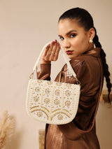 Kavya white flap-over bag with handle from The Tan Clan, featuring a stylish beige design and structured silhouette.