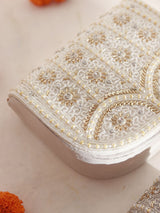 White flap-over bag with handle by The Tan Clan, featuring beige accents and a stylish, spacious design for everyday use.