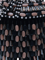 Black Bella round embellished bag with handle by The Tan Clan, featuring decorative details and a sturdy shoulder strap.