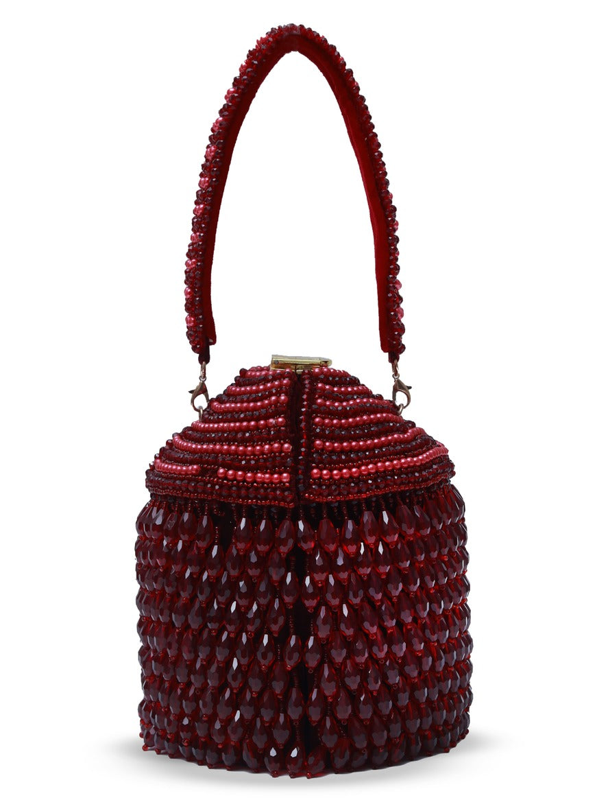 Black Emma Round Embellished Bag with Handle by The Tan Clan, featuring decorative embellishments and a sturdy handle.
