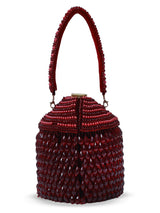 Black Emma Round Embellished Bag with Handle by The Tan Clan, featuring decorative embellishments and a sturdy handle.