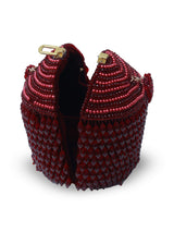 Black Emma Round Embellished Bag with Handle by The Tan Clan, featuring decorative embellishments and a sturdy handle.