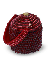 Black Emma round embellished bag with handle by The Tan Clan, featuring decorative details and a stylish, compact design.