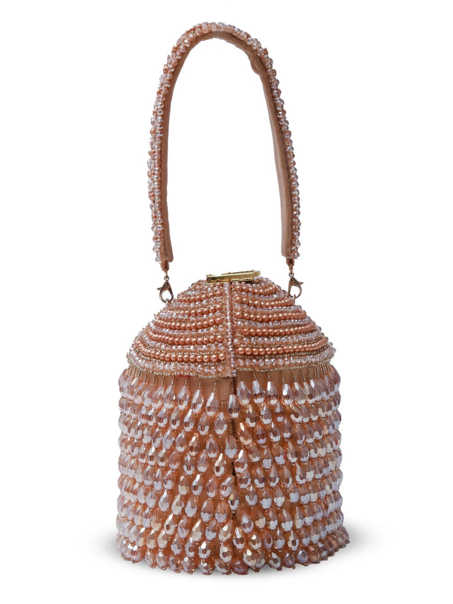 Black Emma round embellished bag with handle by The Tan Clan, featuring decorative details and a stylish carrying handle.