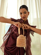 Black Emma round embellished bag with handle by The Tan Clan, featuring decorative accents and a stylish design.