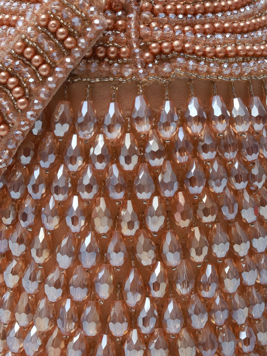 Black Emma Round Embellished Bag with Handle by The Tan Clan, featuring decorative details and a sturdy handle.