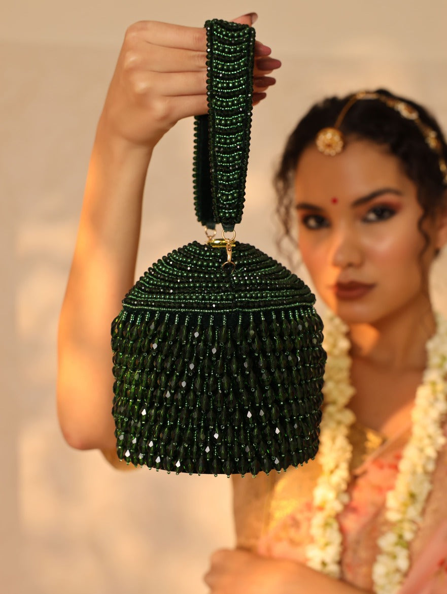 Emma round embellished bag with handle by The Tan Clan, featuring decorative details and a stylish, compact design.