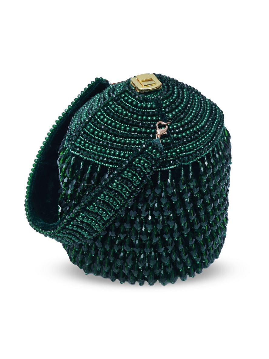 Emma round embellished bag with handle by The Tan Clan, featuring decorative details and a stylish circular design.