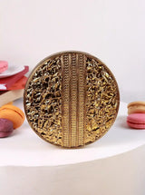 Beth Brass Clutch by The Tan Clan featuring a sleek, metallic brass finish and compact design for elegant evening use