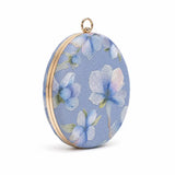 Blue embroidered clutch bag from The Tan Clan with floral detailing, designed for elegant evening or special occasion wear.