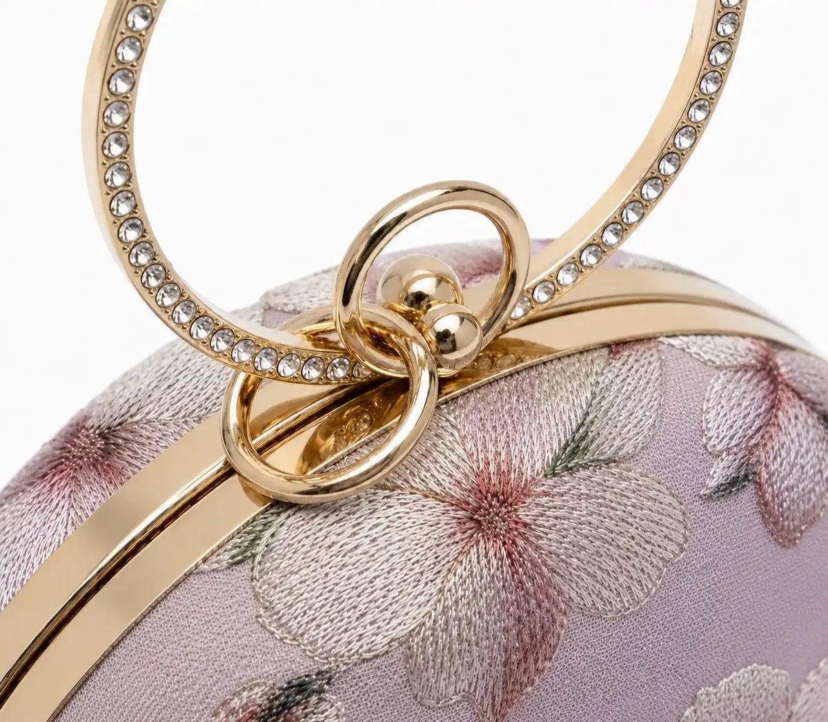 Bloom Mauve embroidered clutch by The Tan Clan, showcasing intricate embroidery and elegant design for stylish occasions.