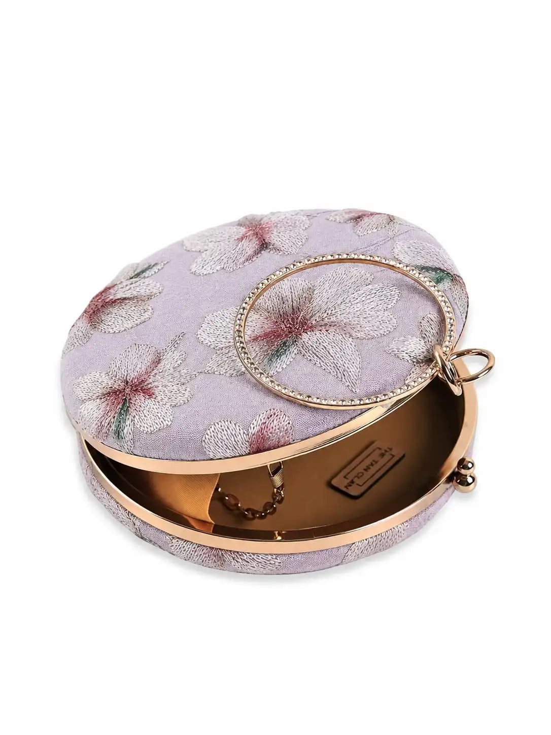 Mauve embroidered clutch by The Tan Clan featuring floral design and elegant fabric for stylish evening accessories.