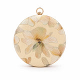 Yellow embroidered clutch bag by The Tan Clan with floral detailing, designed for elegant evening or special occasion use.
