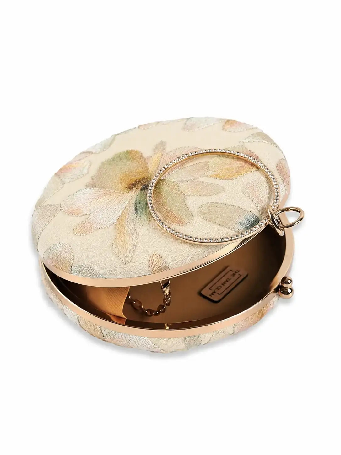 Yellow embroidered clutch bag by The Tan Clan featuring floral embroidery and a sleek, compact design.