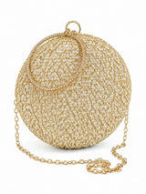 Gold sequined round clutch bag from The Tan Clan with sparkling surface and elegant design.