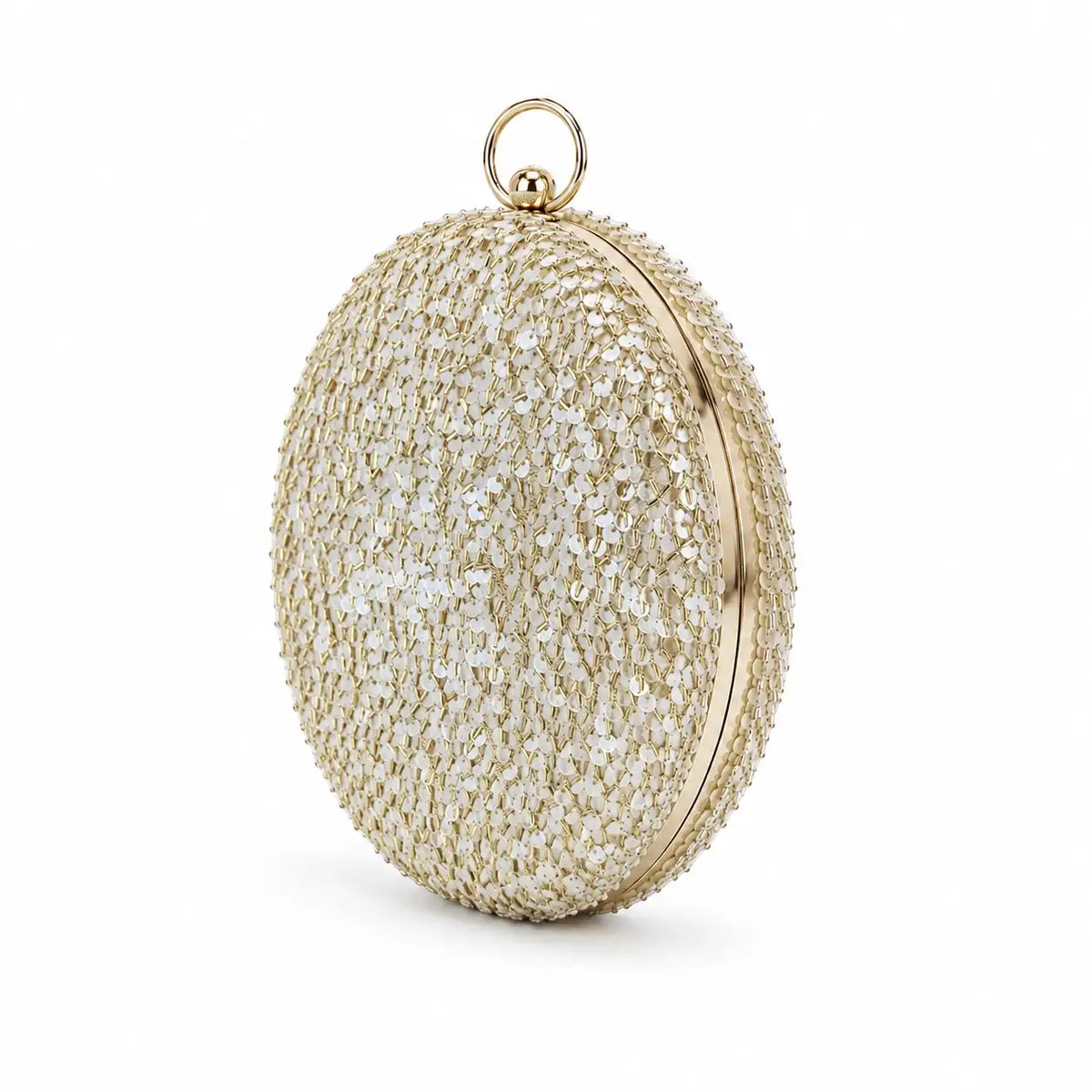 Gold sequined round clutch bag by The Tan Clan with shimmering surface and elegant design for special occasions.