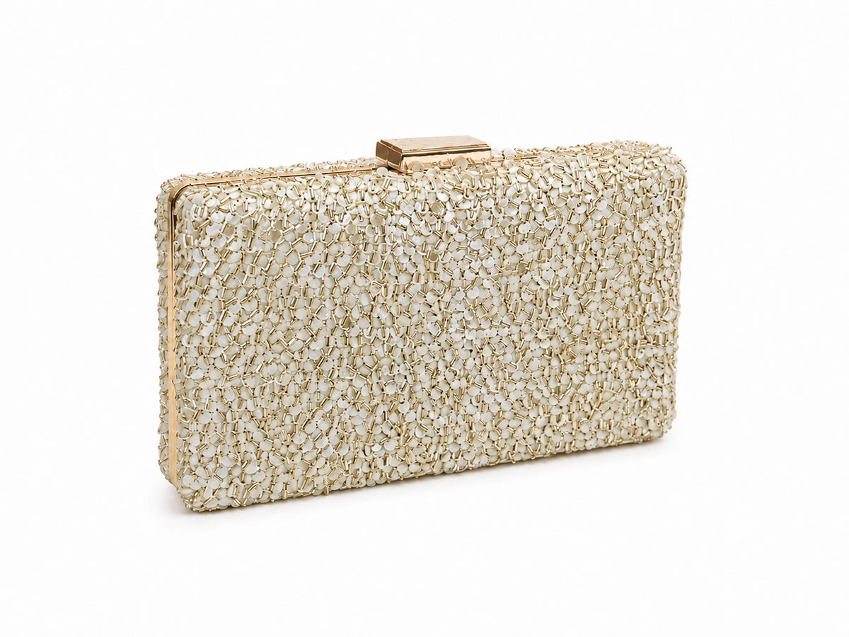 Gold sequined sleek clutch bag by The Tan Clan, featuring a compact design with shimmering embellishments for elegant occasions.