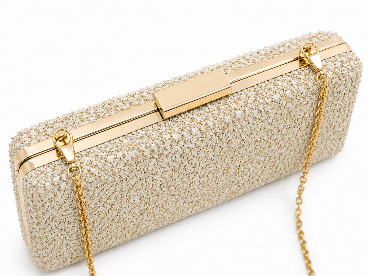 Gold sequined sleek clutch bag by The Tan Clan, featuring elegant design and compact size for evening occasions.