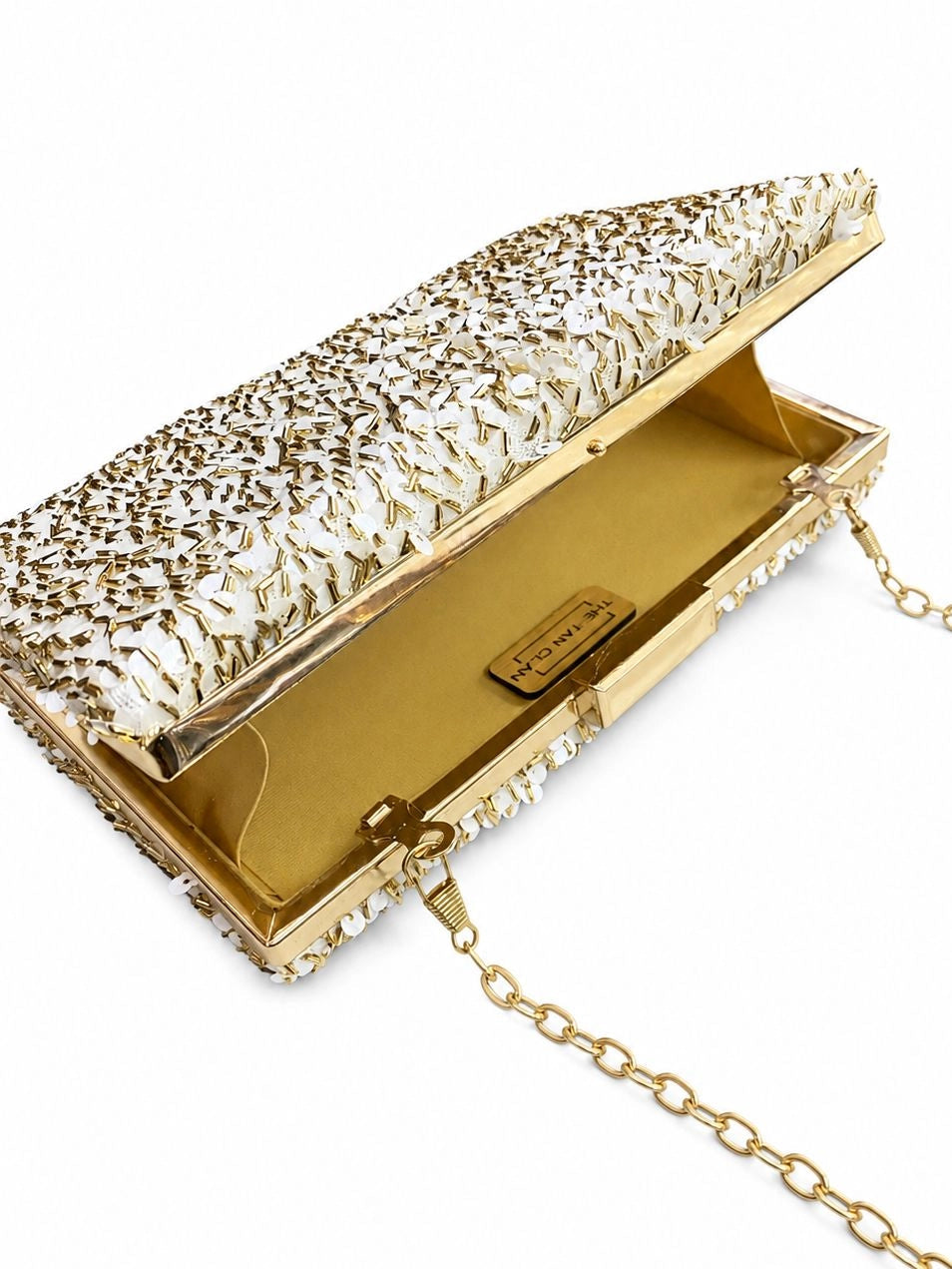 Gold sequined sleek clutch bag by The Tan Clan, featuring a shimmering design and compact style for evening occasions.