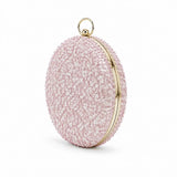 Dazzle Pink Sequined Round Clutch from The Tan Clan featuring sparkling pink sequins and a round shape for evening events.