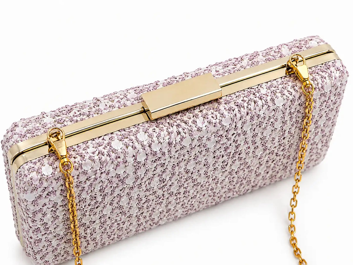 Dazzle pink sequined sleek clutch bag by The Tan Clan, featuring shimmering sequins and a slim elegant design.