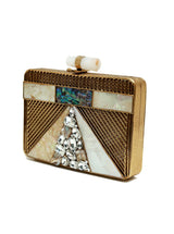 Dina Brass Clutch by The Tan Clan featuring a sleek, modern design with a metallic brass finish and minimalist style.