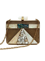 Dina Brass Clutch by The Tan Clan featuring a sleek brass finish and compact design, perfect for stylish evenings.