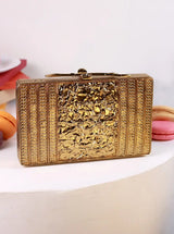 Elena Brass Clutch by The Tan Clan, elegant gold-toned clutch with sleek design, featuring a metallic finish and compact shape.