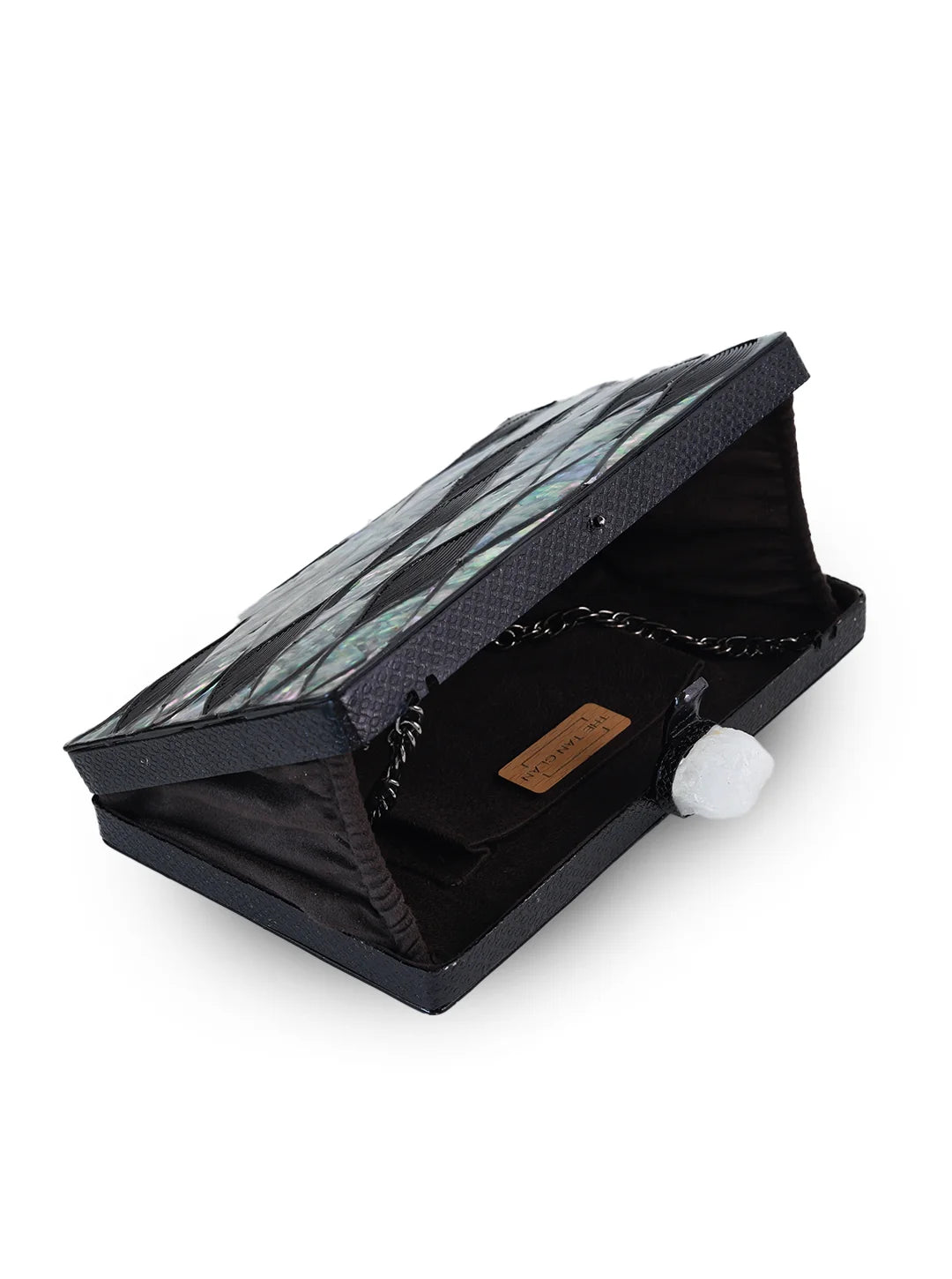 Eve Brass Clutch by The Tan Clan featuring a sleek gold-toned metallic surface and compact design.
