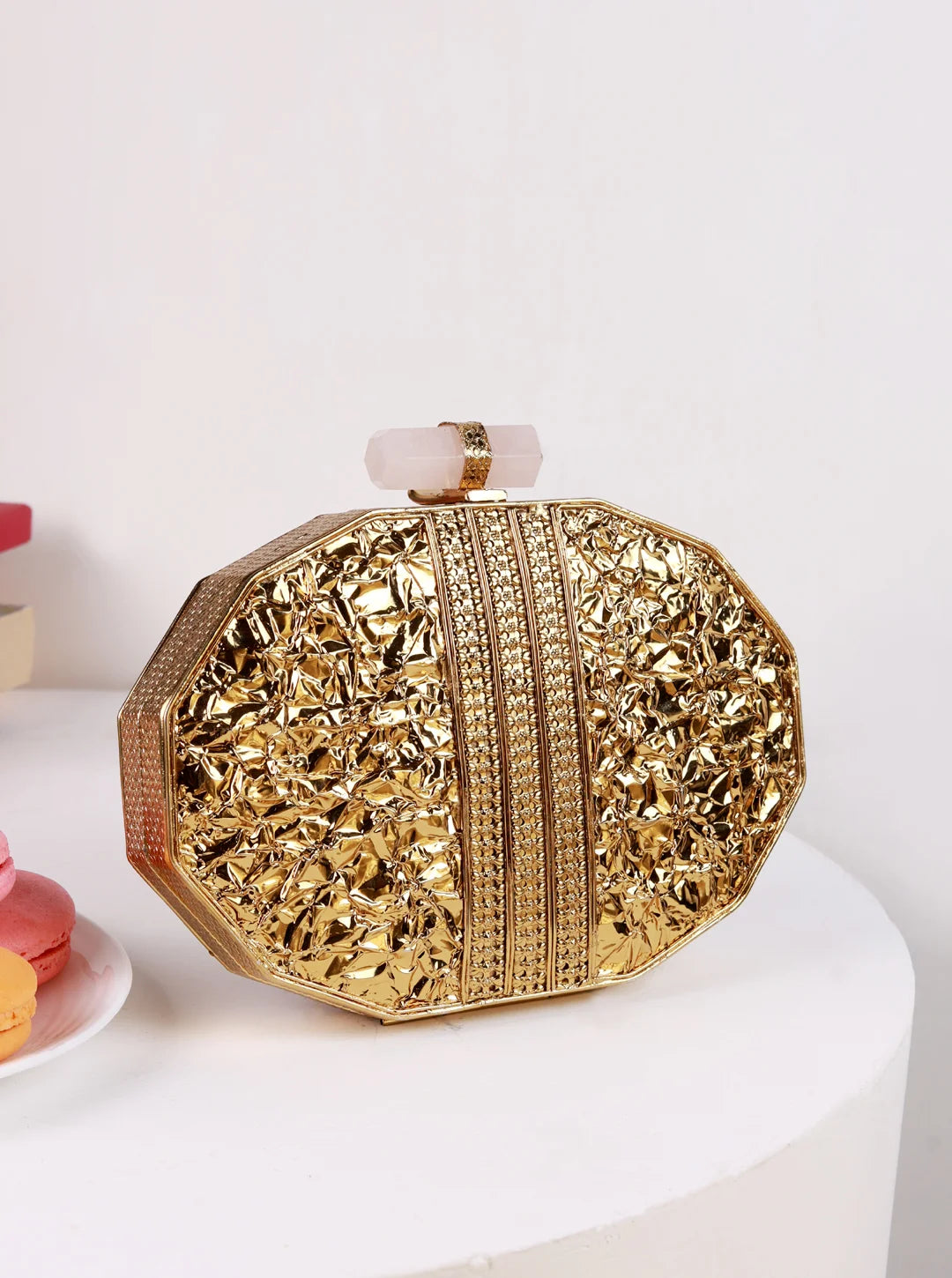 Giana Brass Clutch by The Tan Clan featuring a stylish metallic finish and compact design for elegant evening accessories.