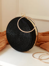 Black Glitz Round Clutch bag by The Tan Clan featuring a shiny, embellished surface and compact, stylish design.