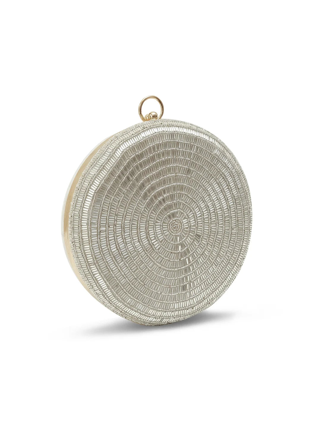 Silver round clutch purse by The Tan Clan featuring a shiny, metallic finish and compact design for elegant occasions.