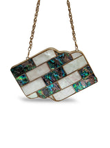 Jean Mother of Pearl Brass Clutch by The Tan Clan featuring a sleek design with pearl accents and brass details.