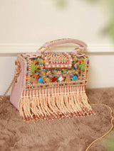 The Tan Clan Kiara Multi-Flap Over Bag clutch with handle, featuring multiple flap closures and a stylish design.