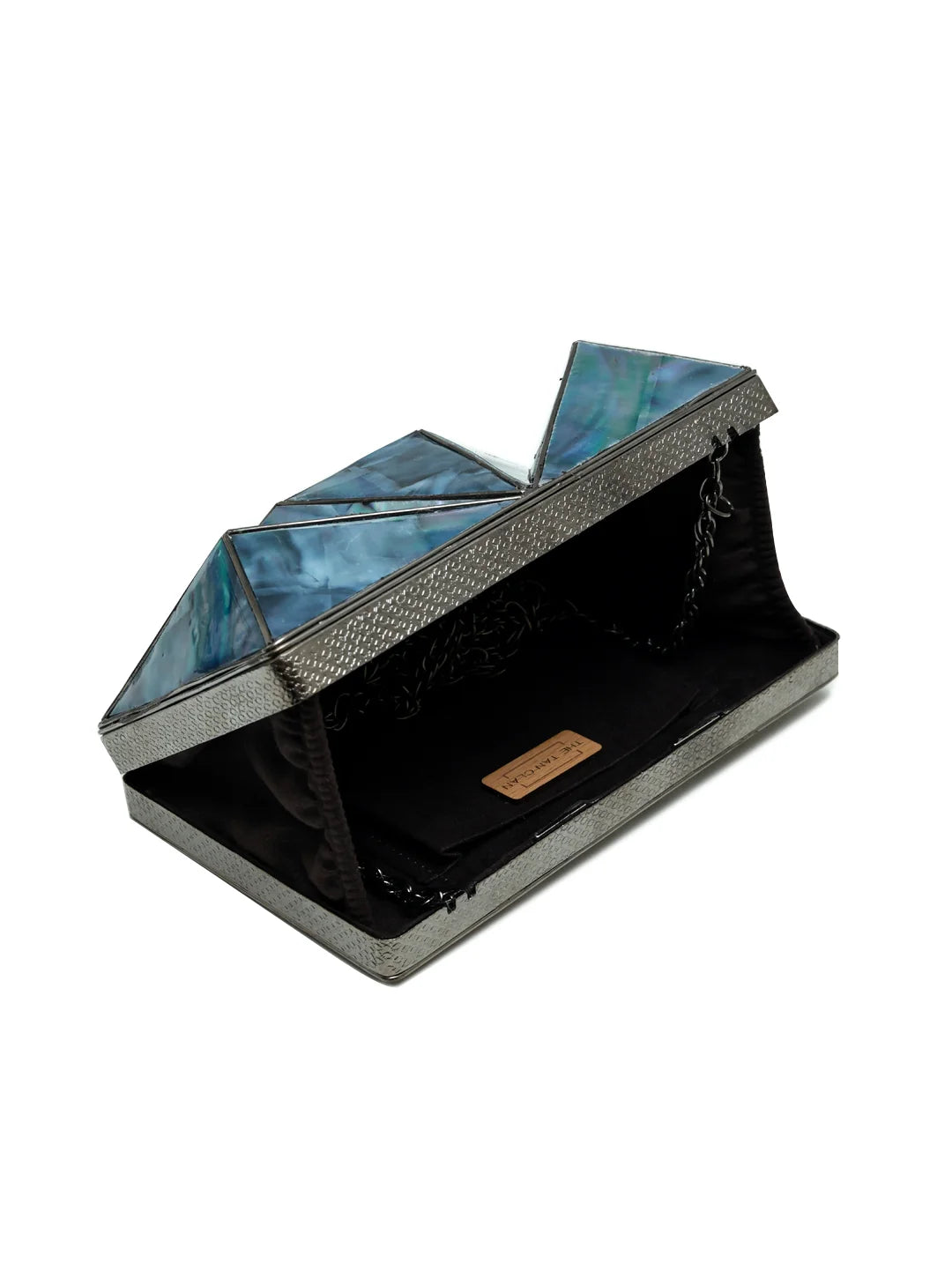 Mindy 3D Brass Clutch from The Tan Clan featuring a stylish 3D brass design and sleek clutch body for elegant occasions.