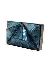 Mindy 3D Brass Clutch by The Tan Clan featuring a stylish, textured brass exterior and sleek design for elegant occasions.