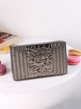 Mindy 3D Brass Clutch by The Tan Clan showing a stylish, textured brass clutch with intricate 3D design and sleek finish.