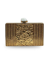 Nayla Brass Clutch by The Tan Clan featuring a sleek, metallic brass finish and elegant design for evening occasions.