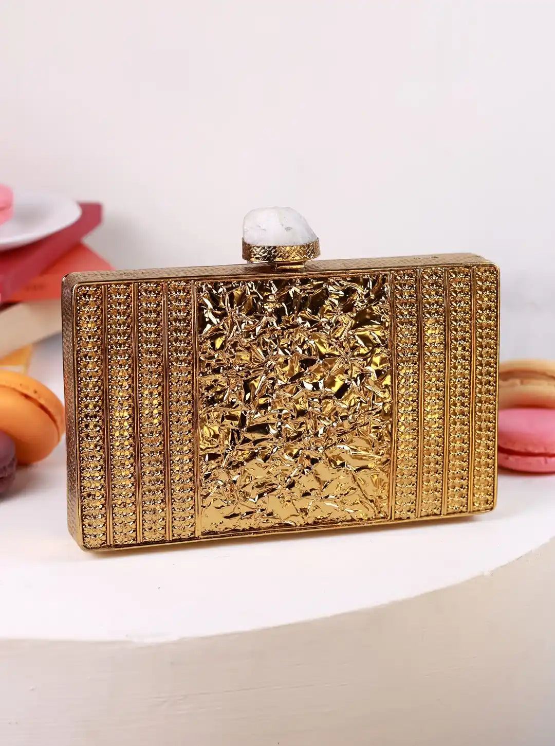 Nayla Brass Clutch by The Tan Clan featuring a sleek metallic design and compact size for elegant evening occasions.